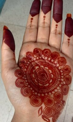 A Royal Front Hand Mehndi Design features elegant motifs and shading