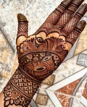 A Royal Front Hand Mehndi Design is loved for its royal appeal