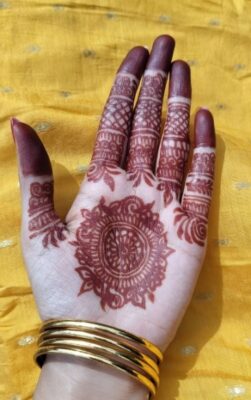 A Royal Front Hand Mehndi Design is perfect for traditional ceremonies