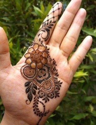 A bold Arabic Mehndi Design stands out instantly