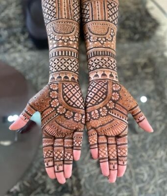 A creative Full Hand Mehndi Design showcases imagination