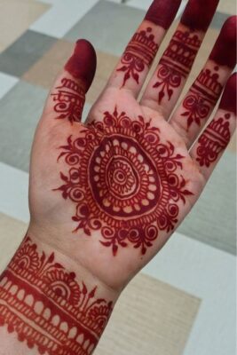 A detailed Royal Front Hand Mehndi Design enhances every outfit