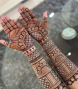 A fine-line Full Hand Mehndi Design looks clean and artistic