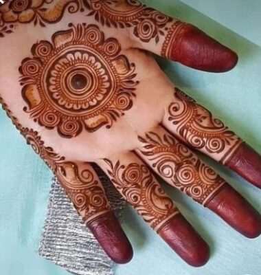 A front-hand Mehndi Design Photo highlights palm patterns