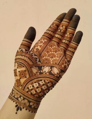 A neat Full Hand Mehndi Design enhances the charm of hands