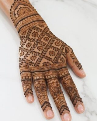 A shaded Full Hand Mehndi Design adds depth and charm