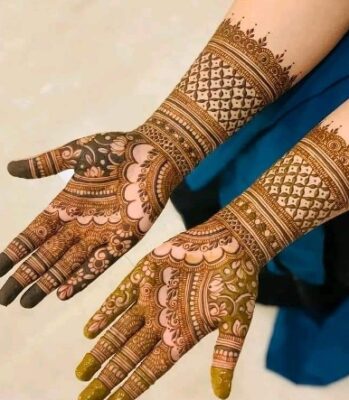 A bridal Full Hand Mehndi Design takes hours to complete