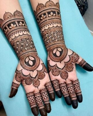 A traditional bridal Full Hand Mehndi Design carries emotional value