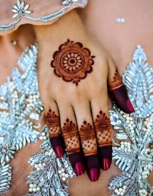Artistic Back Hand Mehndi Design shows creativity