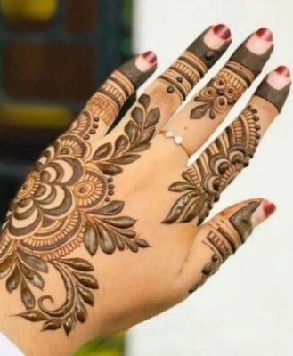 Back Hand Mehndi Design looks graceful with bangles