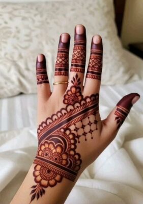 Back Hand Mehndi Design looks royal on bridal hands