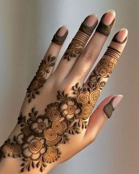 Back Hand Mehndi Design suits bridal functions