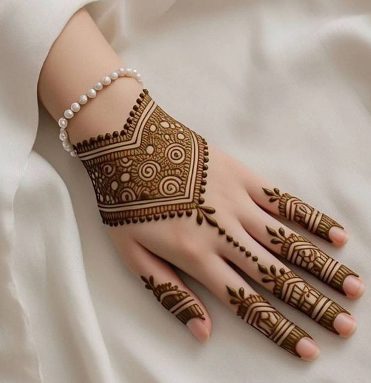 Back Hand Mehndi Design with flowers is popular