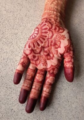 Bold strokes make a Royal Front Hand Mehndi Design stand out