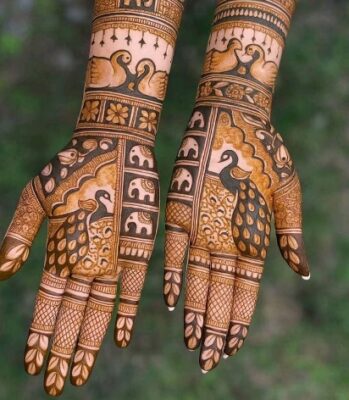 Brides often choose a detailed Full Hand Mehndi Design for their big day
