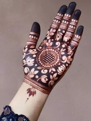 Every festive look shines with a Royal Front Hand Mehndi Design