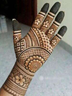 Festival days look incomplete without Front Hand Mehndi Design