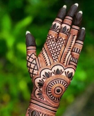 Intricate lines complete a Royal Front Hand Mehndi Design gracefully