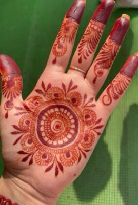 Many artists love creating a Royal Front Hand Mehndi Design for weddings