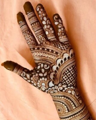 Patterns flow smoothly in a Royal Front Hand Mehndi Design
