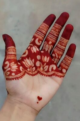 Photos look stunning with a Royal Front Hand Mehndi Design