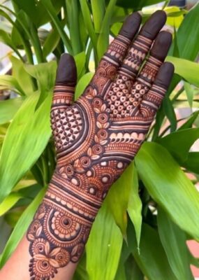 Traditional elements make a Royal Front Hand Mehndi Design timeless