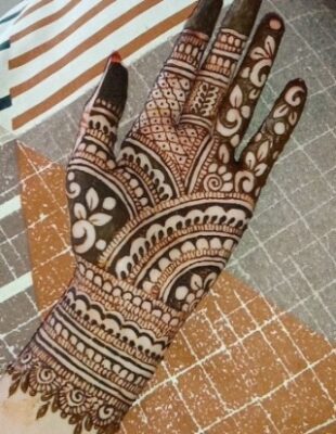Weddings glow brighter with a Royal Front Hand Mehndi Design