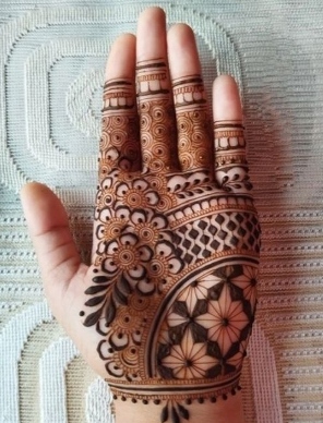 Women love the charm of a Royal Front Hand Mehndi Design