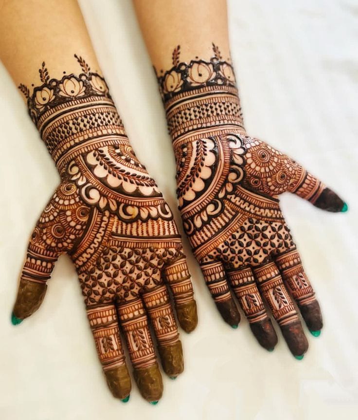Brides love choosing a royal front hand mehndi design for weddings