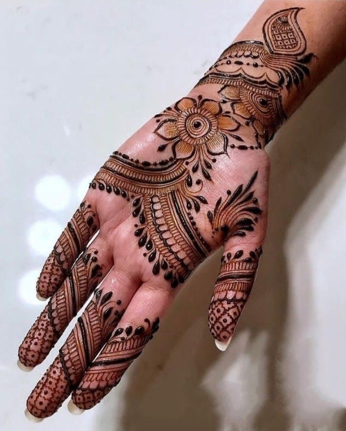 Front hand arabic mehndi design highlights beautiful details