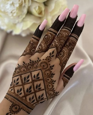 Mehndi Design Back Hand highlights finger patterns