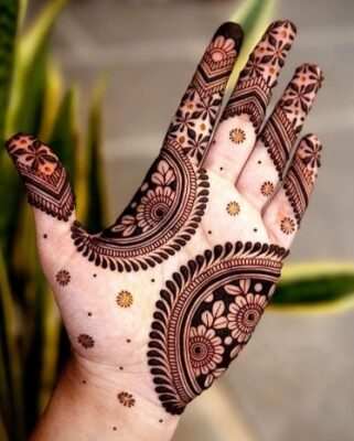 Mehndi Design is applied using natural henna