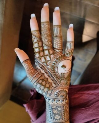 Mehndi Design matches both ethnic and modern wear