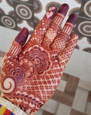 Mehndi Design matches both ethnic and modern wear