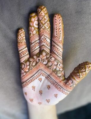 Royal Front Hand Mehndi Design completes the bridal look