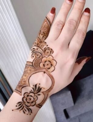 Stylish Back Hand Mehndi Design enhances natural hand beauty