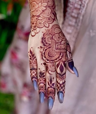 Stylish Back Hand Mehndi Design never goes out of fashion