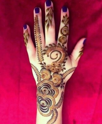 Stylish Back Hand Mehndi Design suits both simple and heavy looks