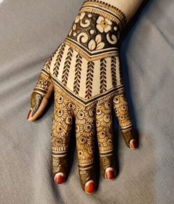 Stylish Back Hand Mehndi Design suits both young girls and women
