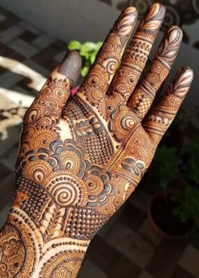 Mehandi Design matches well with ethnic jewelry