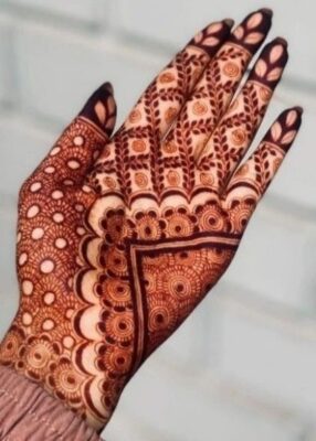 Royal Front Hand Mehndi Design adds grace to wedding outfits