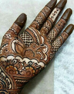 Royal Front Hand Mehndi Design adds grace to wedding outfits