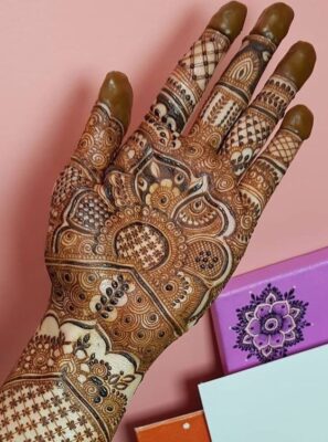 Royal Front Hand Mehndi Design enhances the beauty of the palm