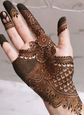 Royal Front Hand Mehndi Design is admired for its rich detailing