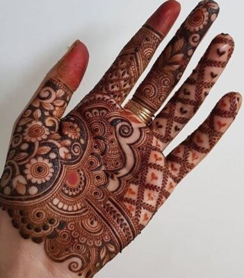 Royal Front Hand Mehndi Design is trending during wedding season
