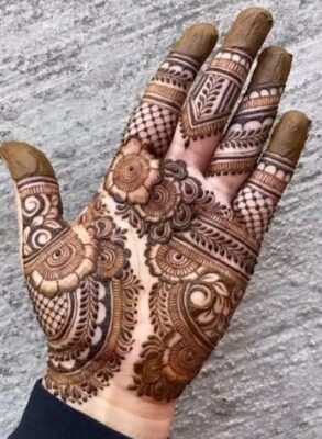 Royal Front Hand Mehndi Design matches well with bridal jewelry