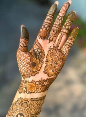Royal Front Hand Mehndi Design matches well with bridal jewelry