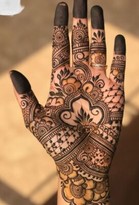 Royal Front Hand Mehndi Design matches well with bridal jewelry