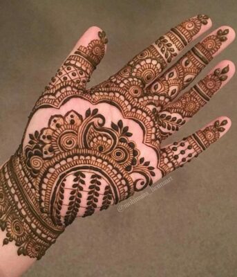 Royal Mehndi Design includes floral and paisley motifs