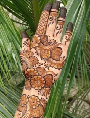 Full Hand Mehndi Design adds charm to traditional outfits